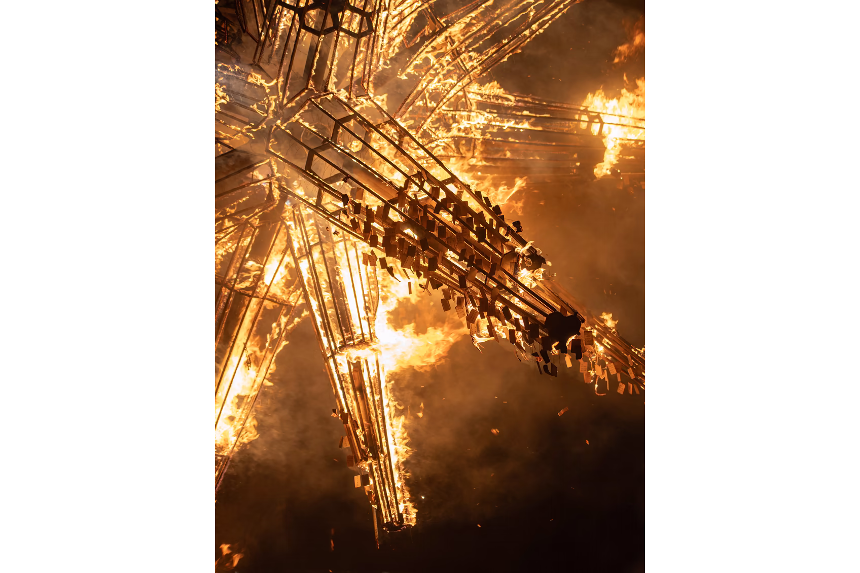 The "Super Star" fire tower installation burning during AURUA's event