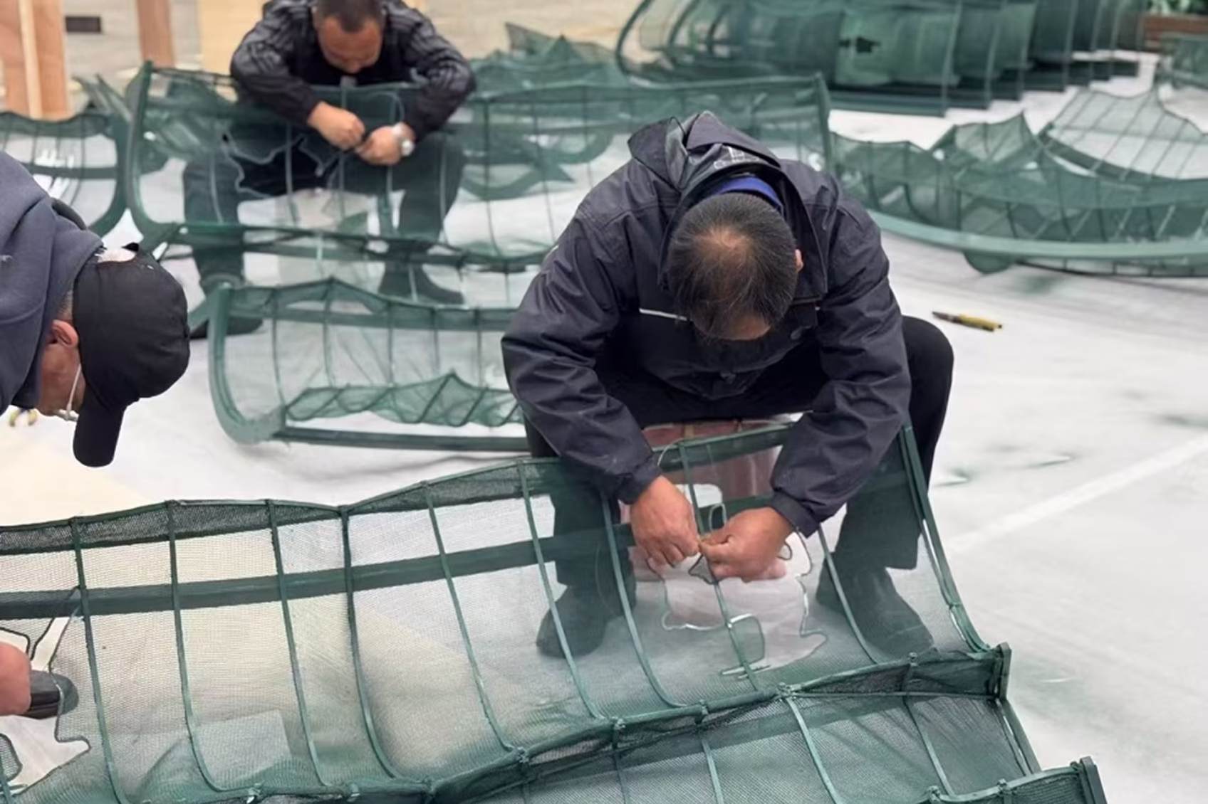 Art installation "Vault of Heaven" created from recycled green construction safety netting
